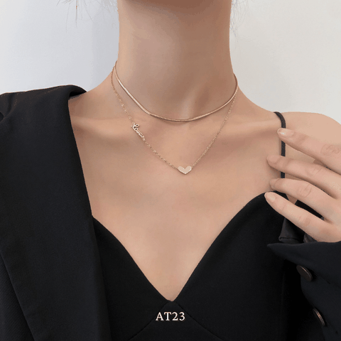 Dây chuyền titan không đen gỉ sợi đôi mặt tim mạ vàng nữ tính thanh lịch AT23