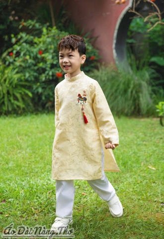 Áo Dài Bé Trai Gấm Kem Kèm Dây Tua Rua