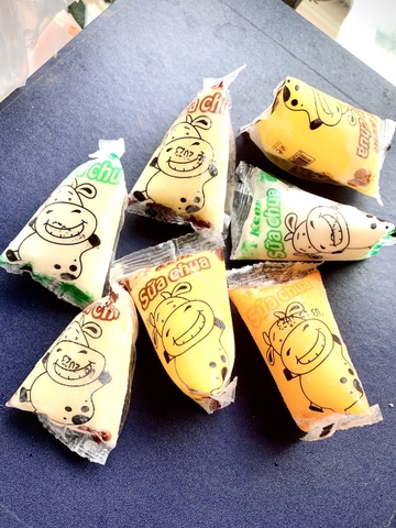 SỮA CHUA TAM GIÁC VỊ CAM - T750