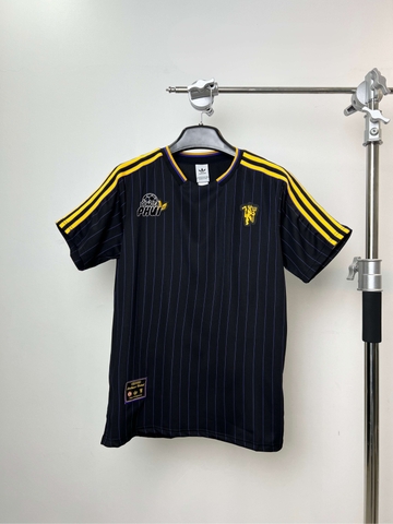 ÁO MU TR ĐEN VÀNG 2025