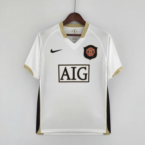 ÁO RETRO MU TRẮNG 2006