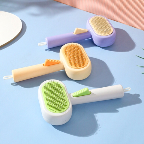 Lược chải lông nút bấm có mặt loại bỏ bụi https://petshopvinh.vn/