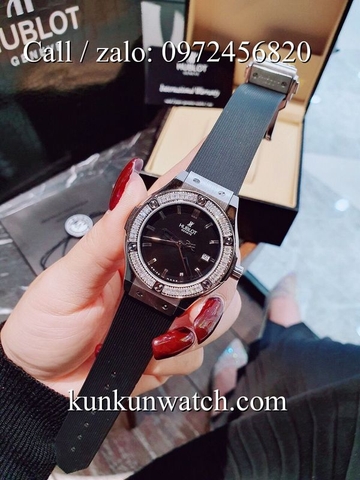 Đồng Hồ Nữ Hublot HLNSV012 - Dây Đen Mặt Đen Vỏ Bạc - 34mm