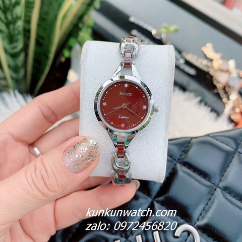 Đồng Hồ Lắc Tay Nữ Rado Điểm Pha Lê 4 Mốc Giờ Dây Đá Ceramic Nâu Đỏ Silver 26mm