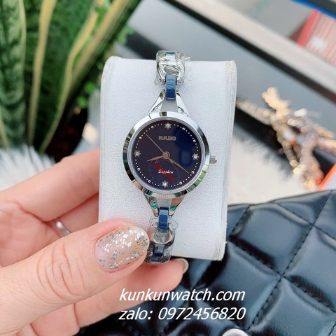 Đồng Hồ Lắc Tay Nữ Rado Điểm Pha Lê 4 Mốc Giờ Dây Đá Ceramic Xanh Silver 26mm