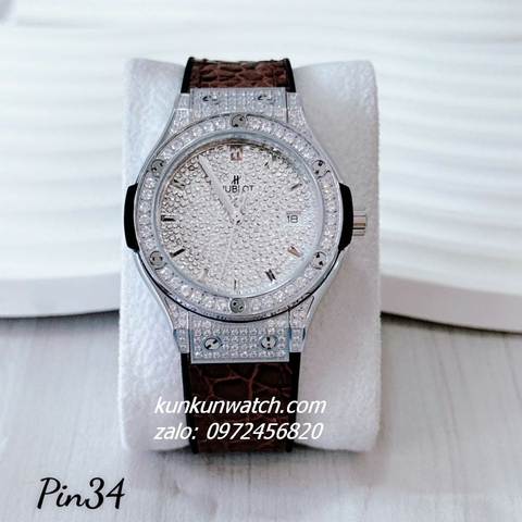 Đồng Hồ Nữ Hublot Classic Fusion Đính Full Đá, Viền Đá Tròn, Lịch Ngày Dây Silicone Da Vân Nâu Silver 34mm