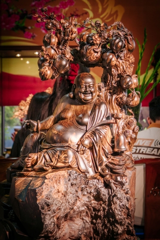 TƯỢNG DI LẶC GỖ NU MUN