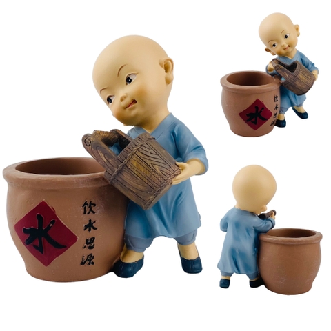 Tượng chú tiểu đổ nước vào chum 41201929