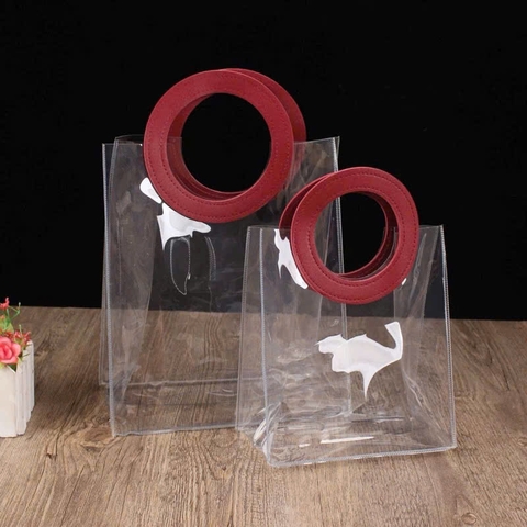 Giỏ nhựa trong quai da tròn