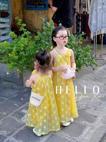 - VÁY YẾM VÀNG IN HOA BÉ GÁI