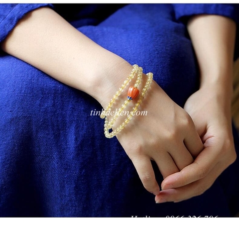 CHUỖI THẠCH ANH TÓC VÀNG 108 HẠT ĐEO TAY