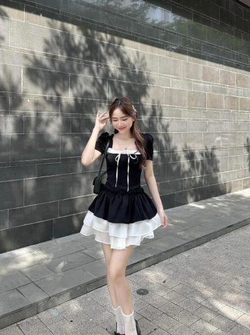 Đầm đen phối tơ cột nơ