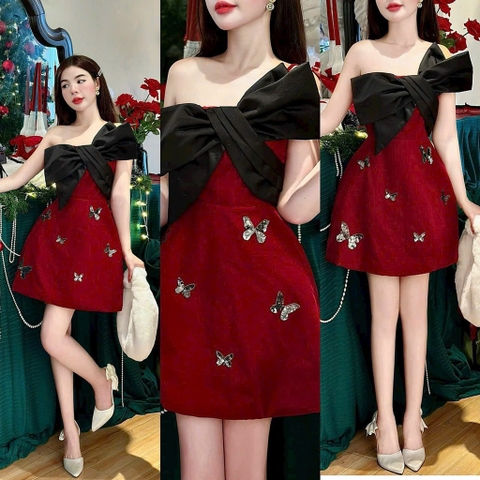 Đầm nhung đỏ nơ to đen lệch vai