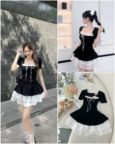 Đầm đen phối tơ cột nơ