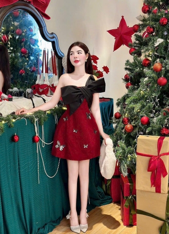 Đầm nhung đỏ nơ to đen lệch vai