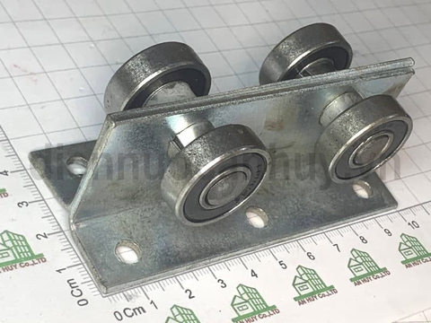 Bánh xe cửa lùa sắt 4 bánh phi 26 U4