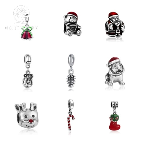 Charm hợp kim xỏ ngang hình trái thông họa tiết nơ đỏ