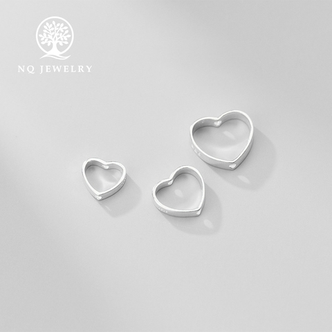 Charm bạc hình trái tim lồng hạt xỏ ngang