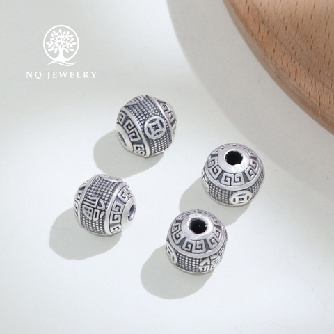 Charm tròn góc cạnh họa tiết đồng tiền