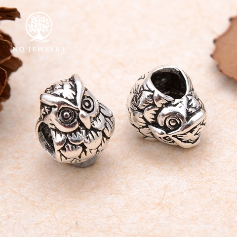 Charm bạc chim vú mèo xỏ ngang