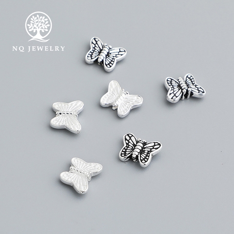 Charm bạc bươm bướm trắng xỏ ngang