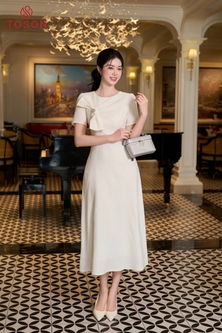 49142E66 - Đầm xòe kem, cổ đính nơ- uni vân gỗ