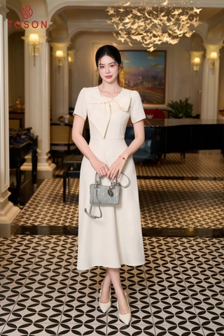 46086W66 - Đầm be kem xòe cổ đính nơ- carolan