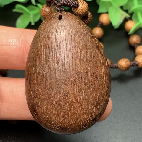 MẶT PHẬT NGỌC PHỈ THÚY CHẠM GỖ TRÒN HP nt0207