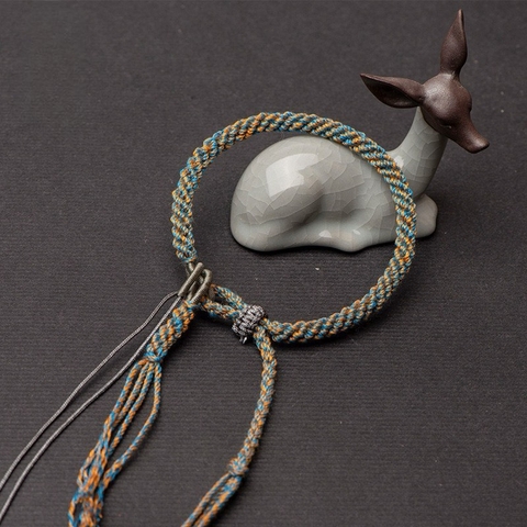 Vòng đeo tay dây dù bện móc charm có tuarua - PK003