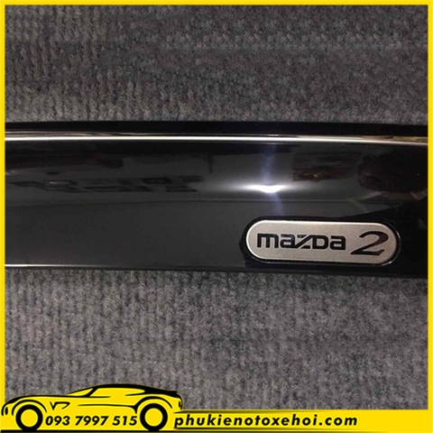 Vè che mưa xe Mazda 2