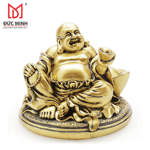 Tượng Phật Di Lặc dựa thỏi vàng