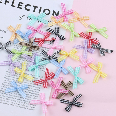 Túi 100 nơ vải nhỏ -MÀU KẺ CARO (kt 0.6x3cm).