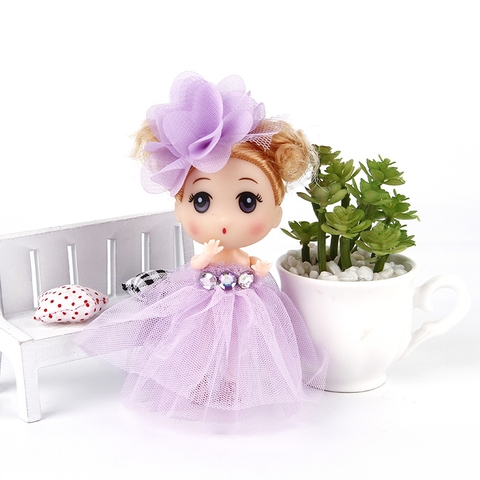 Túi 10 Búp bê đội nơ 12cm - váy tím