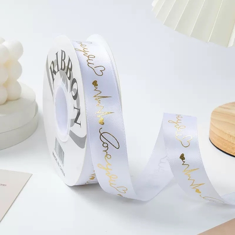 Ruybang lụa 2.5cm x 35m chữ love you gắn trái tim nhũ vàng - màu TRẮNG.