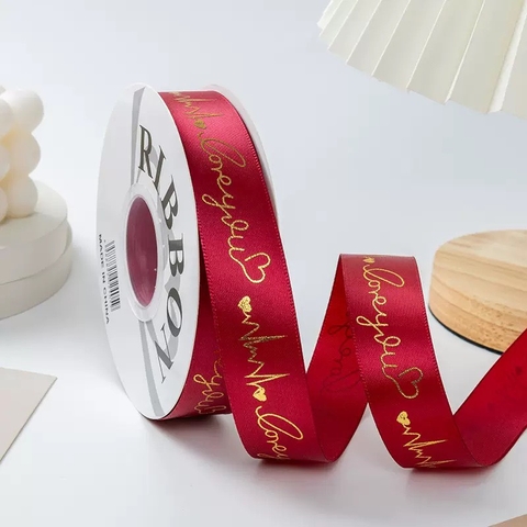 Ruybang lụa 2.5cm x 35m chữ love you gắn trái tim nhũ vàng - màu ĐỎ ĐÔ.
