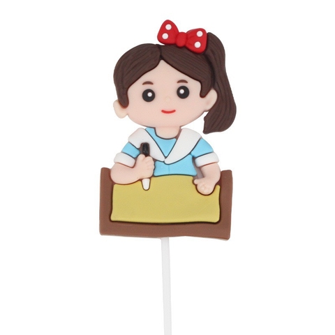 Tượng nhựa dẻo-Bé GÁI áo xanh ngồi bàn học bài.