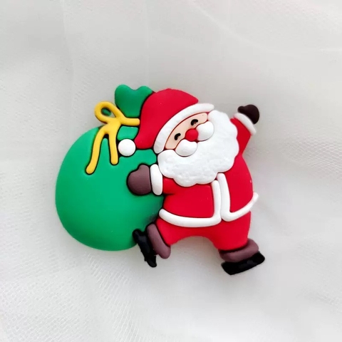 Tượng nhựa dẻo-Ông già noel nhún nhảy và hộp quà xanh.