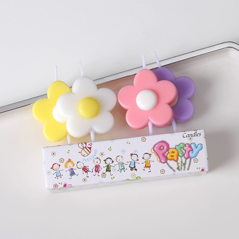 Vỉ nến 4 bông hoa đào (trắng-vàng-hồng-tím).
