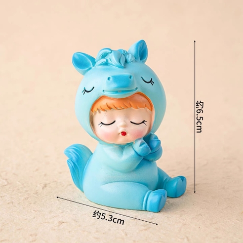 Tượng sứ -bé ngựa tóc vàng duỗi chân (MÀU XANH).