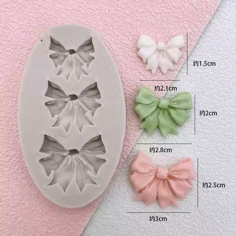 Khuôn silicon hình bầu dục -  3 Nơ to nhỏ.