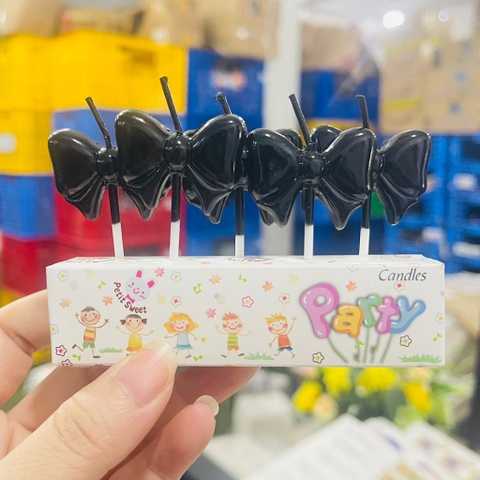 Vỉ 5 cây nến hình nơ màu ĐEN.