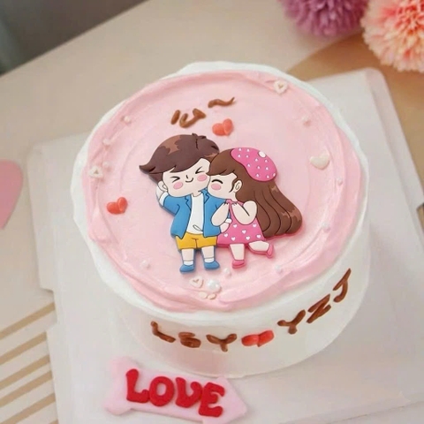 Tượng nhựa dẻo -đôi tình yêu thơm má (váy hồng, áo xanh dương).