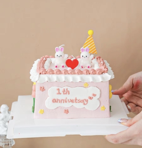 Vỉ 3 nến thỏ trắng giơ tay.
