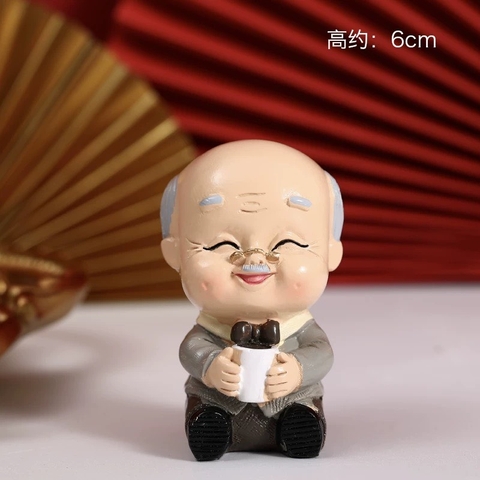 Tượng sứ -ÔNG uống trà.