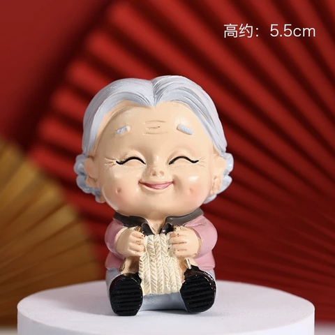 Tượng sứ -BÀ đan len.