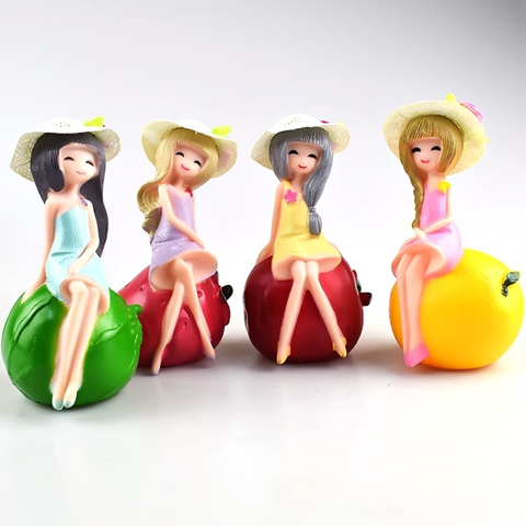 Tượng 4 cô gái ngồi quả  (nhựa cứng).