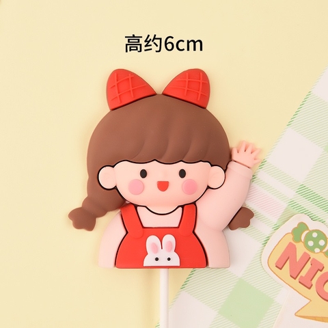 Tượng nhựa dẻo loại dày-bé gái nơ đỏ giơ tay.