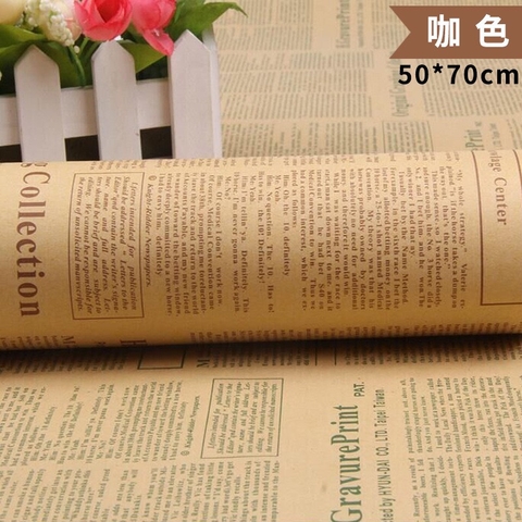 Tập 40 tờ giấy báo kt 50x70cm.