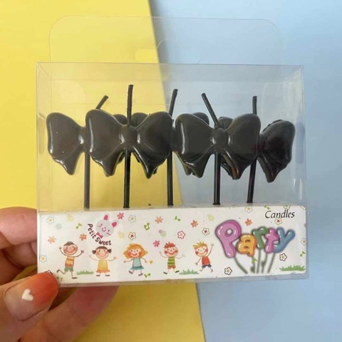 Vỉ 5 cây nến hình nơ màu ĐEN.