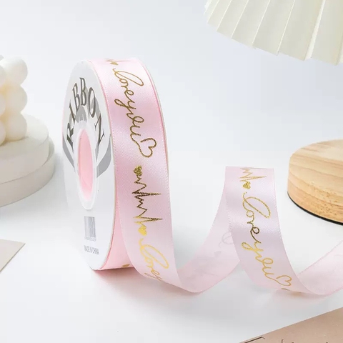 Ruybang lụa 2.5cm x 35m chữ love you gắn trái tim nhũ vàng - màu HỒNG.